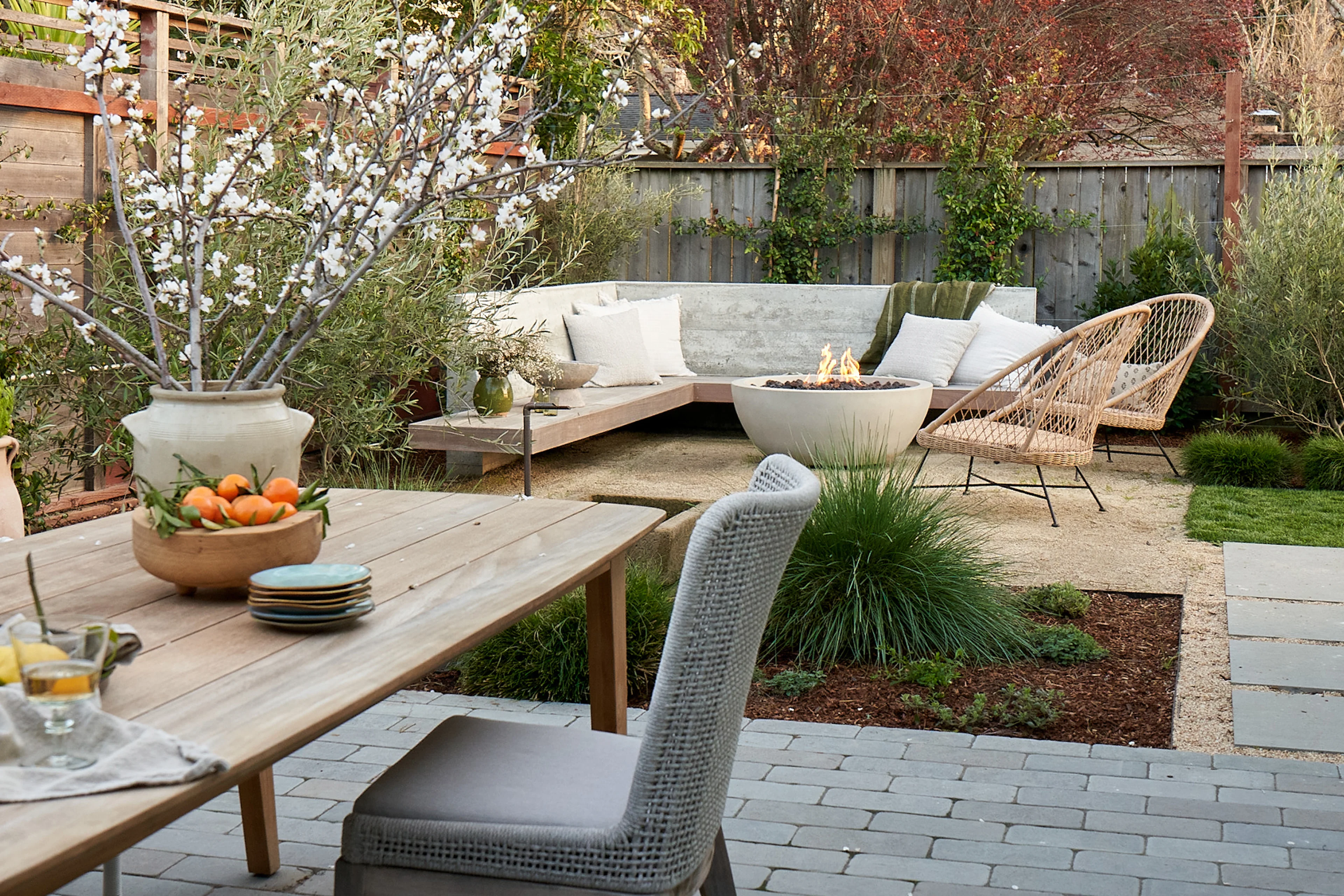 Illustrated garden landscape with layered planting, pathways and designed outdoor spaces