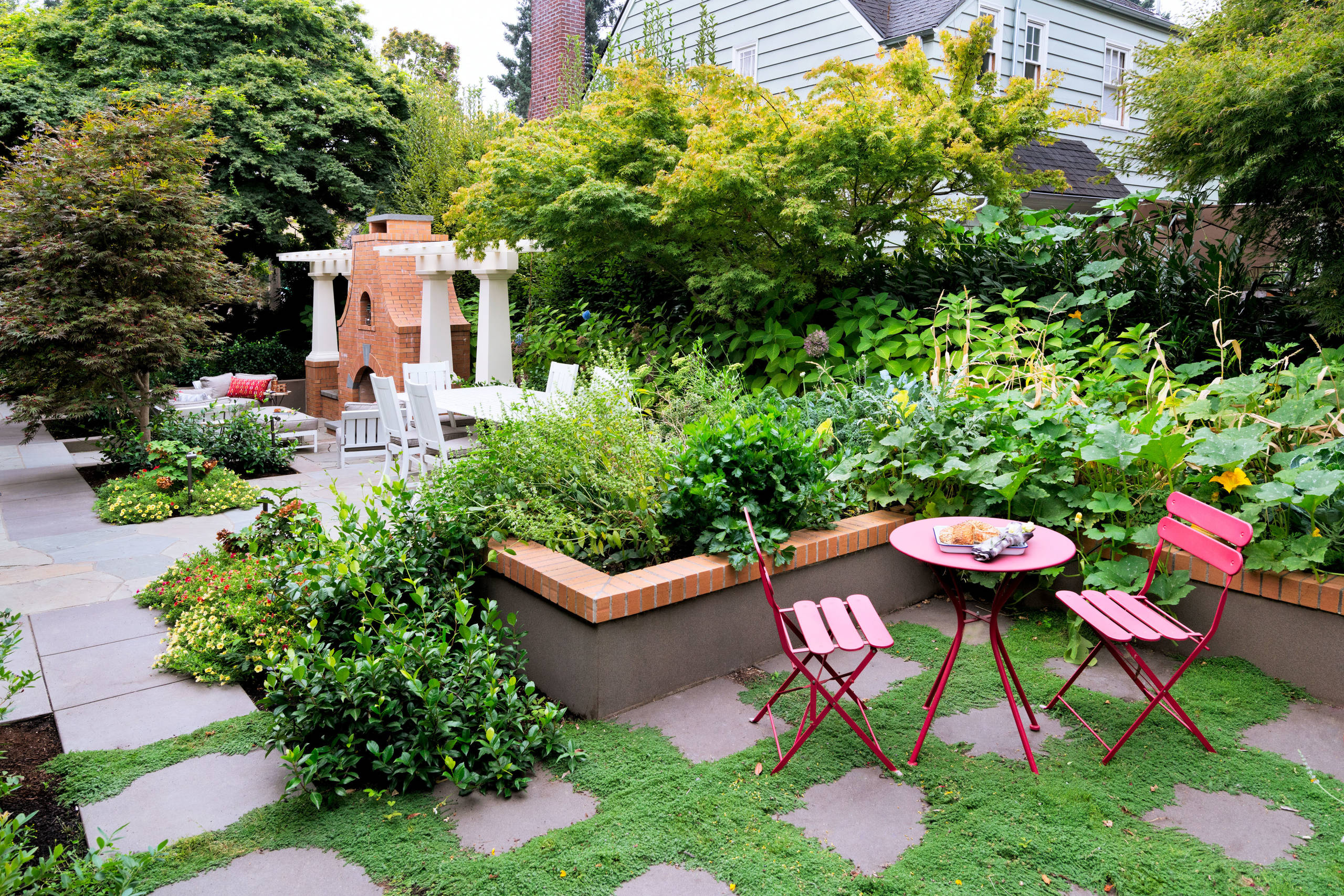 Detailed garden layout with layered planting and designed outdoor areas