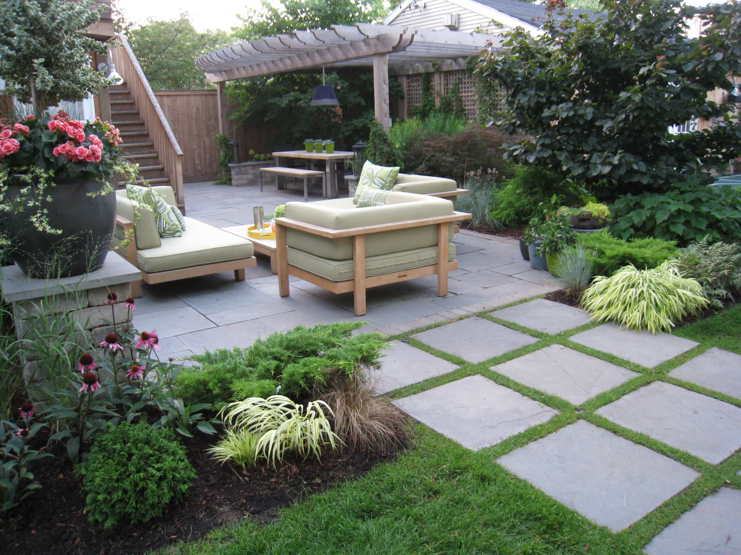 Professionally designed garden with layered planting and structured outdoor spaces